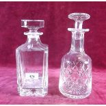 Two cut glass decanters