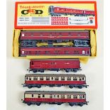 A Triang Railways R381 boxed pair of maroon livery sleeping cars, an R23 Mail Coach and an R28 and
