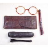 A silver tipped cheroot holder, cased with a pair of lorgnette glasses - cased