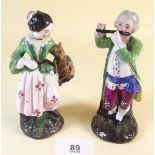 A pair of 19th century continental porcelain figures