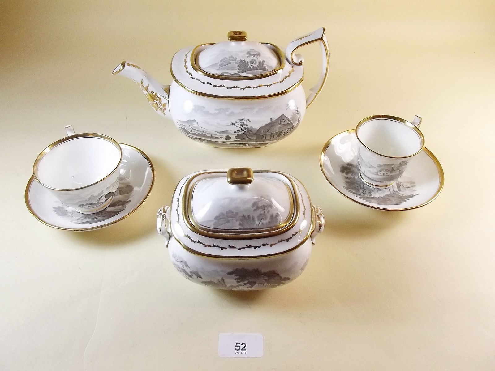 An early 19th century Spode tea and coffee service bat printed country scenes comprising: teapot,