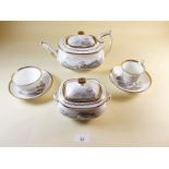 An early 19th century Spode tea and coffee service bat printed country scenes comprising: teapot,