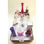 A collection of various perfume bottles including Chanel No 5 EdT