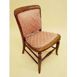 A Victorian mahogany nursing chair