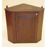 A small 19th century mahogany wall corner cabinet with single panel door - 42cm high