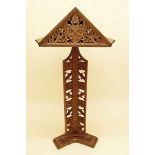 An early 20th century oak carved church lectern with floral carved column and eagle decoration -