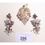 An Indian yellow metal pendant set rubies and white stones - 8.8g, and a pair of yellow metal