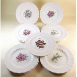 A set of fourteen Spode Bermuda flower plates made for Wm Buck and Co