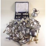 A box of silver plated cutlery including boxed teaspoons and sugar tongs