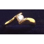 A 14k gold and diamond solitaire ring with certificate, size N