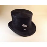 A Dunn & Co black silk top hat
