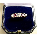 A gold ring set two rubies and three diamonds - unmarked, size P