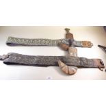 Two mid 20th century Yemeni dress daggers and belts