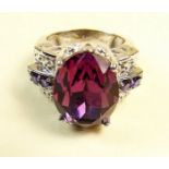 A Swarovski purple crystal set ring