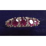 A 9 carat gold ruby ring, size K