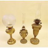 Two brass oil lamps - one by Hinks, and a gilt gesso oil lamp