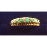 A 9 carat gold ring set turquoise - size J