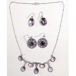 Two amethyst set earrings in silver and a necklace
