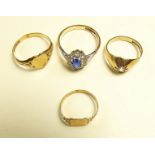 A nine carat gold dress ring and three gold children's rings - total weight 5.4g