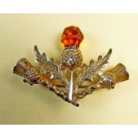 A Scottish silver stone set thistle brooch by C & N