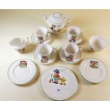 A child's teaset depicting Little Jack Horner comprising teapot, milk and sugar, four cups, saucers,