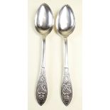 A pair of continental silver serving spoons