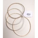 A set of four various 9 carat gold bangles 18g