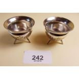 A pair of Mappin and Webb silver salts of miniature cauldron form engraved swags of flowers -