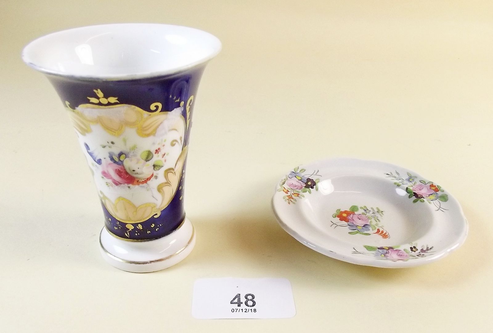 A small early 19th century hand painted vase and miniature plate c.1820 - 1830