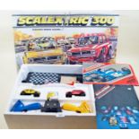 A Scalextric 300 Model racing set boxed with two mini 1275 GT cars and 19th and 20th edition