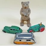 Three Dinky vehicles including a Chrysler, caravan and Aveling, steam roller with a cast bear