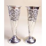 A pair of small Victorian silver floral embossed spill vases - London 1898 - 98g - 11.5cm tall