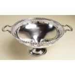 A silver two handled bon bon dish with pierced border by Walker and Hall - Birmingham 1922, 57g