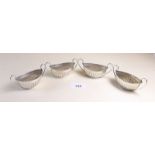 A set of four silver boat form salts - Birmingham 1907, 73g