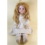 An SFBJ bisque headed doll with impress markings to back of head 'D S.F.B.J 60 Paris 7' - with