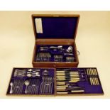 An extensive Goldsmiths Company silver plated Kings Pattern cutlery set fitted in oak case