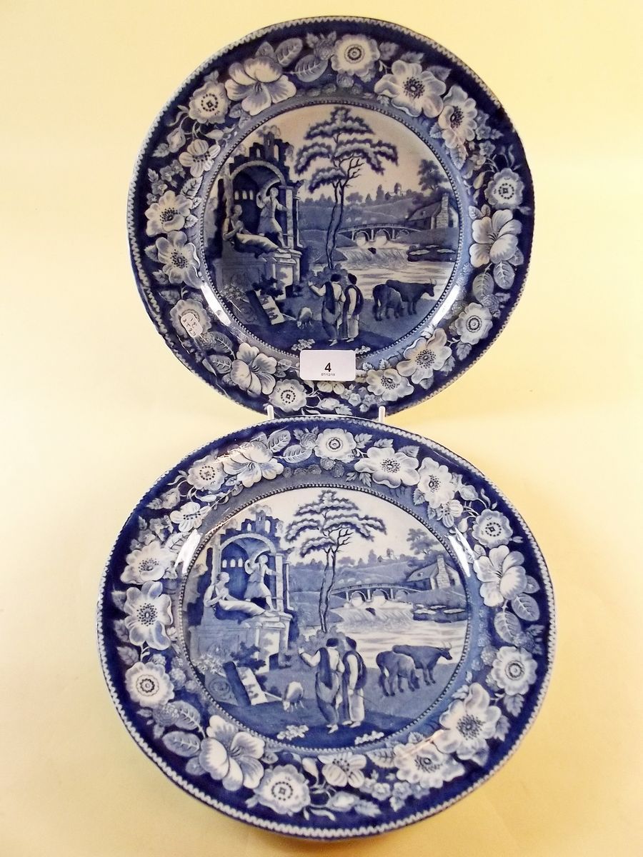 A pair of blue and white Pearlware transfer print plates in the 'Philosopher' pattern c.1820