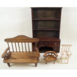 A selection of wooden dolls furniture