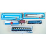 An Airfix Railway System A1A Class 31/4 Diesel BR blue livery - boxed and a 1st class Intercity open