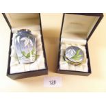 A Moorcroft enamel vase decorated snowdrops 7.5cm tall, together with a pill box - both boxed