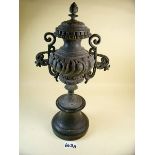 A Victorian black decorative metal urn - 38cm