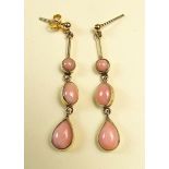 A pair of 9 carat gold coral drop earrings for pierced ears (only one butterfly)