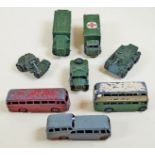 A group of Dinky buses and military vehicles