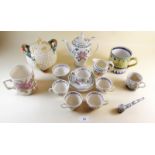 A group of china including a Bristol Delft coffee set of five cups, six saucers, milk jug, sugar and