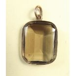 A gold mounted smokey quartz pendant - a/f