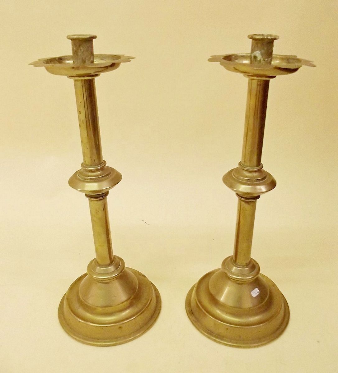 A pair of large brass ecclesiastical candlesticks - 46cm high