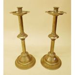 A pair of large brass ecclesiastical candlesticks - 46cm high