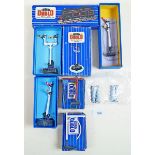 A group of Hornby Dublo items including: three rail trackside components - boxed, DI loading gauge ,