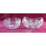 A cut glass fruit bowl and basket