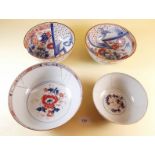 Four Imari bowls - repairs and cracks to three